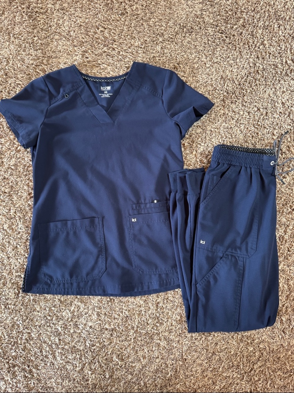 koi Next Gen Navy Scrub Top and Jogger Pants Set